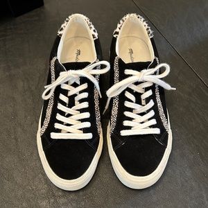 Madewell black suede sneaker with animal print detail. Cream laces and sole.